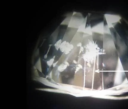 Macro view of a laser drill channel inside a diamond