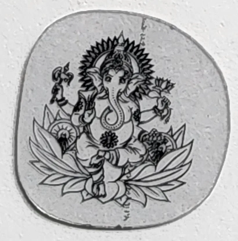 Ganesha engraved on a flat diamond