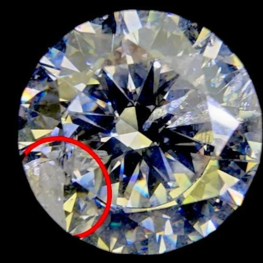 Diamond with a visible feather before fracture filling